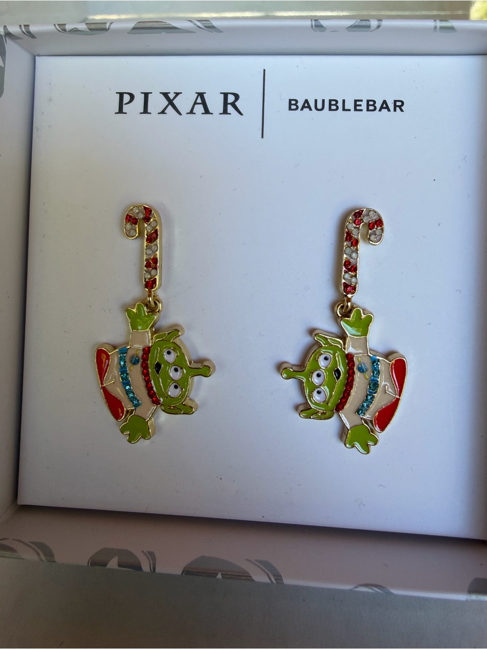 BaubleBar Pixar Green Alien Dangle Earrings with Red and Blue Accents NWT